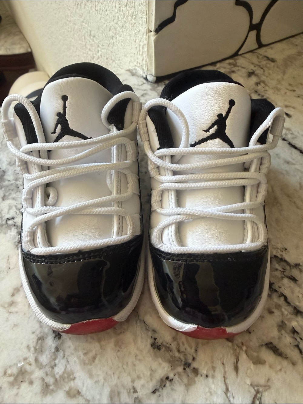 Jordan Kids Low-Top Sneakers in White, Black and Red
